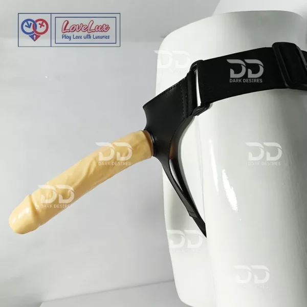 Black faux leather 9 inch strap on dildo with adjustable harness kit for pegging in India. Realistic, flesh colour, and solid design without balls by LoveLuxToys