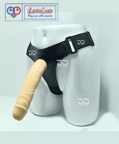 Black faux leather 9 inch strap on dildo with adjustable harness kit for pegging in India. Realistic, flesh colour, and solid design without balls by LoveLuxToys