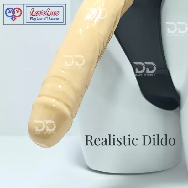 Black faux leather 9 inch strap on dildo with adjustable harness kit for pegging in India. Realistic, flesh colour, and solid design without balls by LoveLuxToys